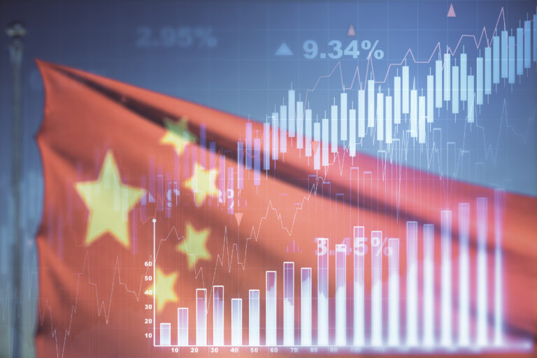 Multi exposure of abstract virtual financial graph hologram on flag of China and sunset sky background, forex and investment concept